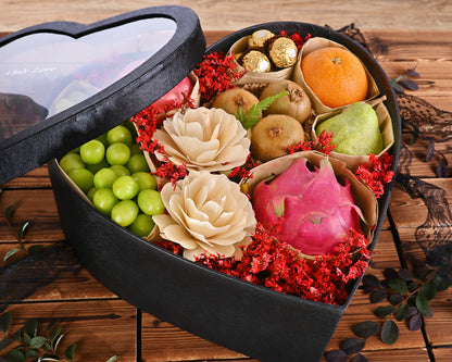 Mesrabloom’s Deluxe Love Fruit Box, a love-shaped box filled with handpicked fruits and exquisite flowers