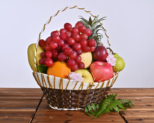 Mesrabloom’s Gift Basket, a beautifully crafted container filled with handpicked fruits and exquisite flowers