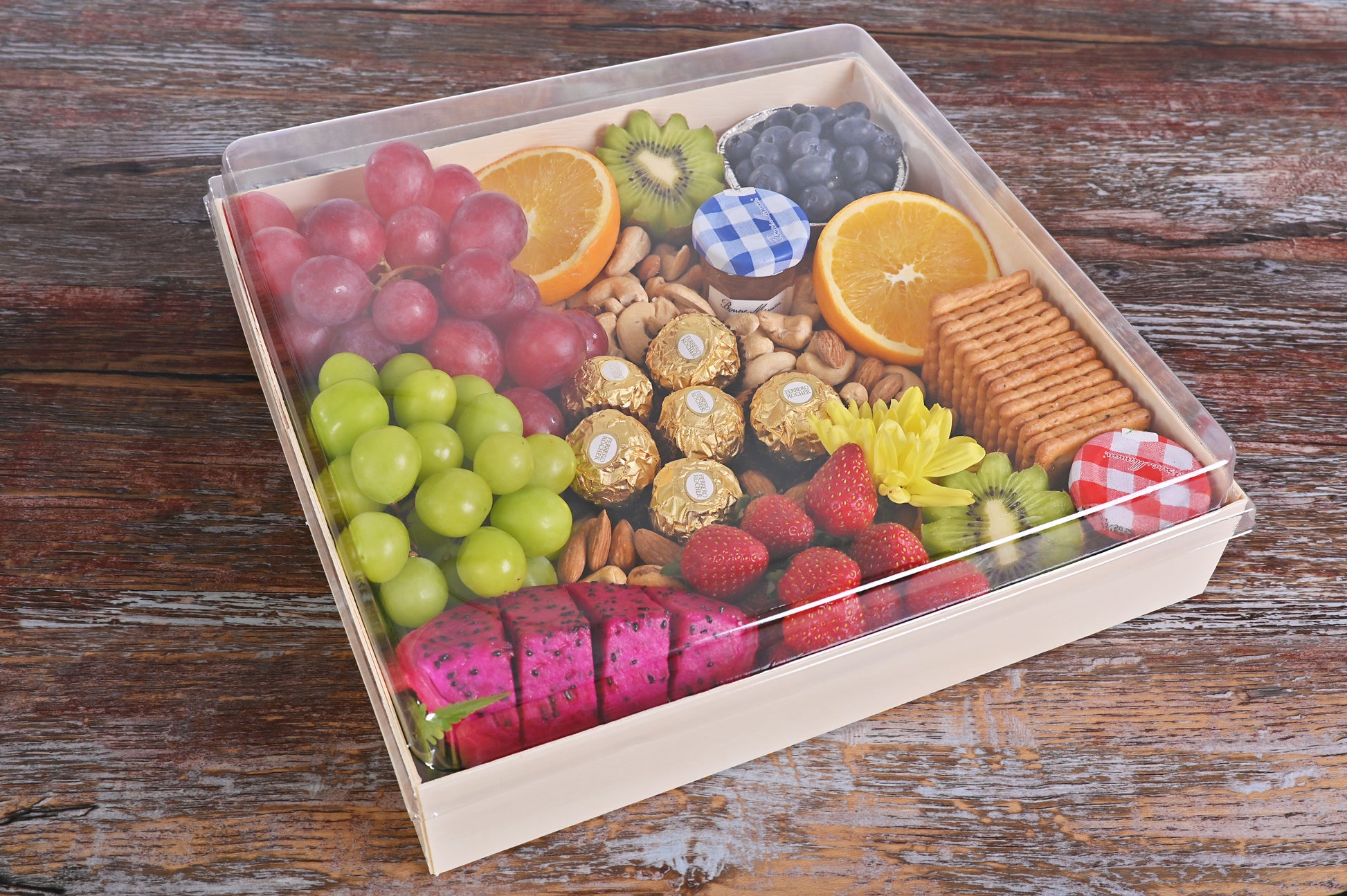 Luxury Ferrero Fiesta, a lavish fruit gift featuring handpicked fruits and Ferrero chocolates.